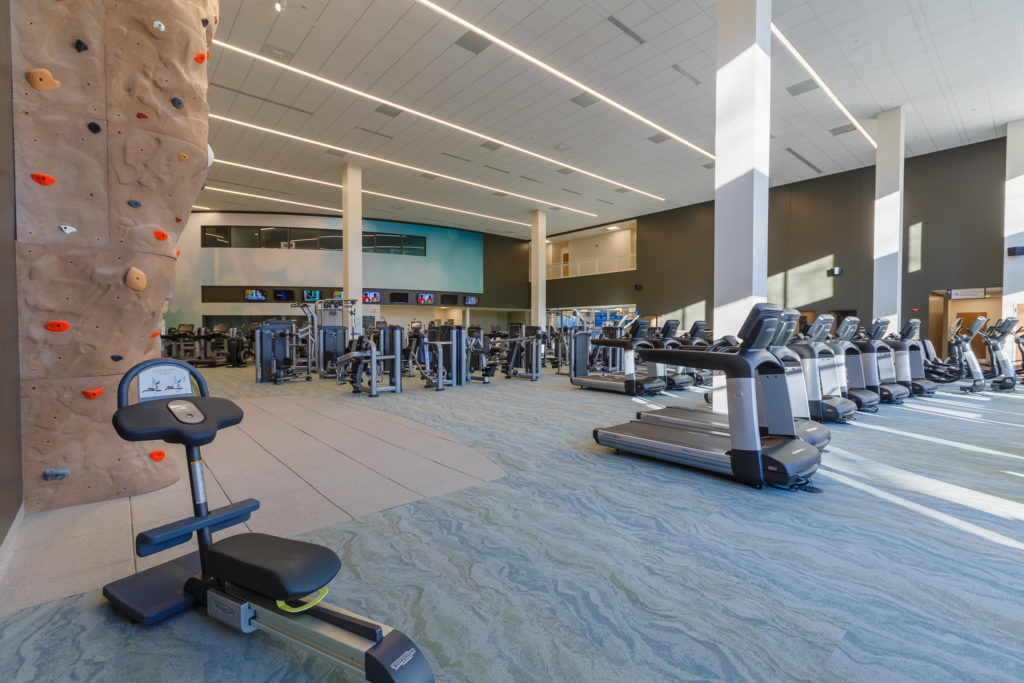 treadmills and rock wall at the valley health and wellness center